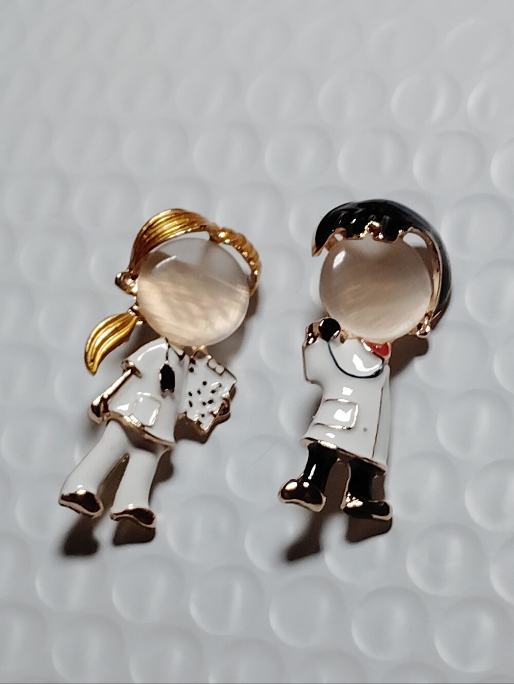 Enamel And Goldtone Doctor And Nurse Brooches White and Gold